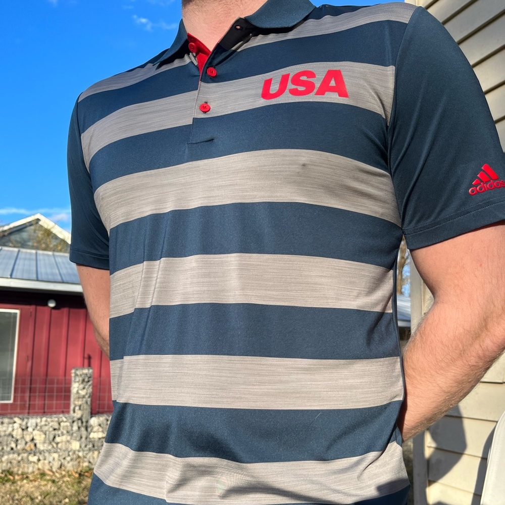 Adidas stripped Golf Shirt w/red buttons. Medium.